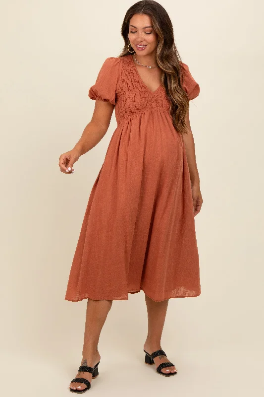 Rust Smocked V-Neck Puff Sleeve Maternity Midi Dress Edgy midi dresses